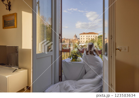 Elegant Morning on a Roman Balcony 123583634