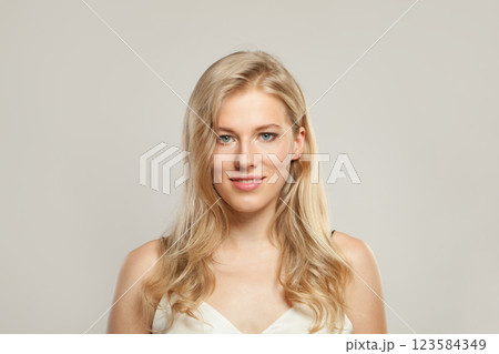 Charming young blond female model with clear skin, soft make-up and healthy hair Charming young blond female model with clear skin, soft make-up and healthy hair 123584349