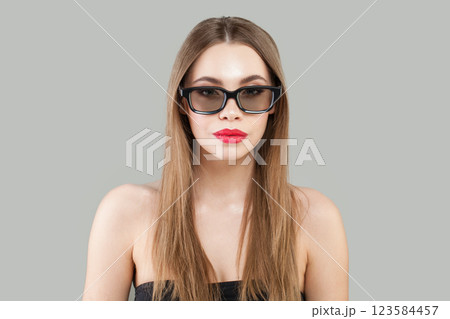 Nice young brunette woman with long shiny silky healthy hair and natural make-up posing Nice young brunette woman with long shiny silky healthy hair and natural make-up posing 123584457