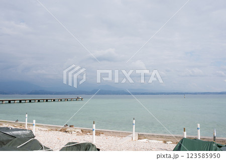 Beautiful aerial view of Garda Lake, wooden pier. No people 123585950