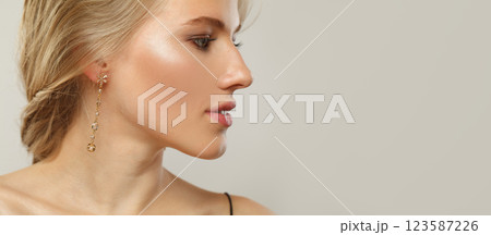 Blond woman profile. Beauty young adult person portrait 123587226