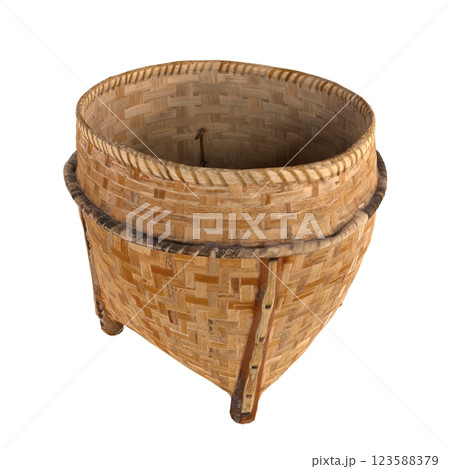 Intricate handmade wicker basket with unique design and structure Intricate handmade wicker basket with unique design and structure 123588379