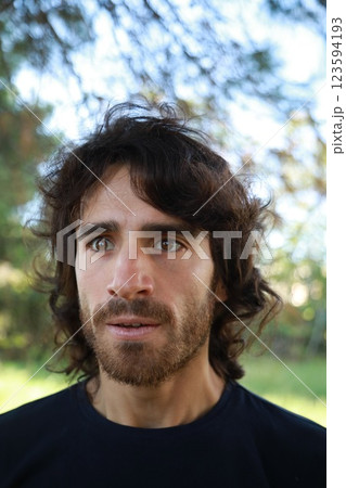 Angry Man Snorts Furiously In Nature Outside Angry Man Snorts Furiously In Nature Outside 123594193