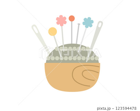 針と待ち針が刺さっているピンクッションをイメージしたイラスト 123594478