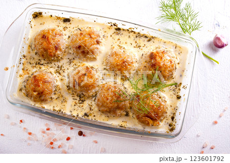 Baked meatballs with spices and white sauce Baked meatballs with spices and white sauce 123601792