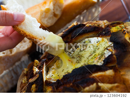 French cuisine, camembert cheese melted in fresh bread French cuisine, camembert cheese melted in fresh bread 123604192