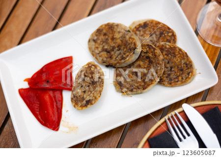 Traditional spanish girella lamb sausage on plate 123605087