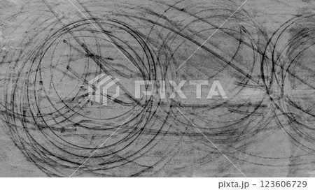 Black tire marks on asphalt road race track, Car tire track asphalt road texture and background, Abstract asphalt road background of tires tracks, Black tyre mark on asphalt road. Black tire marks on asphalt road race track, Car tire track asphalt road texture and background, Abstract asphalt road background of tires tracks, Black tyre mark on asphalt road. 123606729