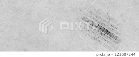 Black tire marks on road, Black rubber tire marks and tread marks, Tire trace track wheels texture and background, Auto tire tread grunge, Car wheel tyre tread track black tyre print, Top view. 123607244