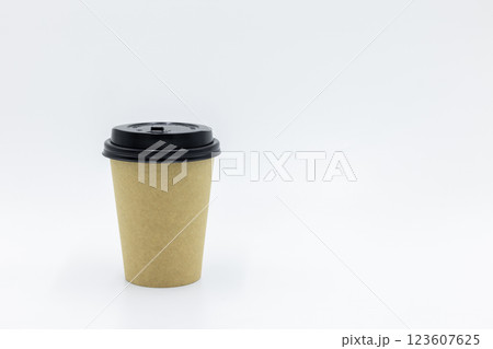 Brown paper coffee cup with black lid on white background, Brown paper cup blank coffee cup for takeaway on white background, Brown empty paper cup for coffee eco coffee cafe. Brown paper coffee cup with black lid on white background, Brown paper cup blank coffee cup for takeaway on white background, Brown empty paper cup for coffee eco coffee cafe. 123607625