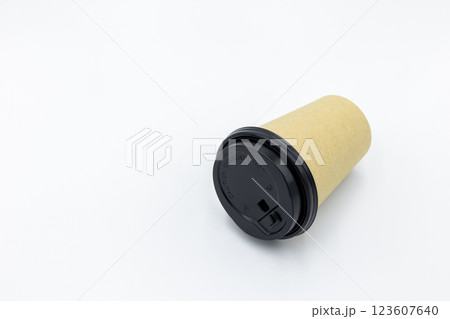 Brown paper coffee cup with black lid on white background, Brown paper cup blank coffee cup for takeaway on white background, Brown empty paper cup for coffee eco coffee cafe. 123607640