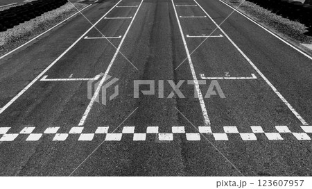 Start or finish line on car race, Start and finish line racing, Grid start race track, Top view textured and background grid start on the asphalt road race track abstract. 123607957