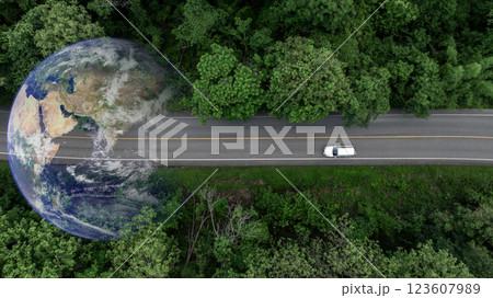 Aerial view EV car electric vehicle car alternative sustainable energy eco power,  EV car electric vehicle car on middle green tree forest road with globe earth planet, Alternative sustainable energy. 123607989