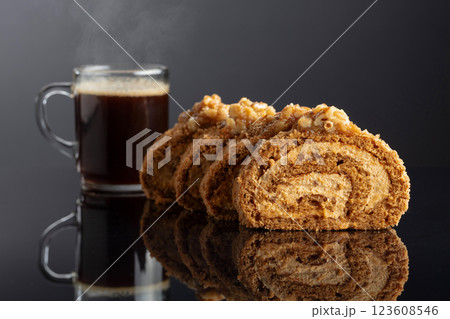 Walnut and buttercream roll: a traditional Oriental pastry. Walnut and buttercream roll: a traditional Oriental pastry. 123608546