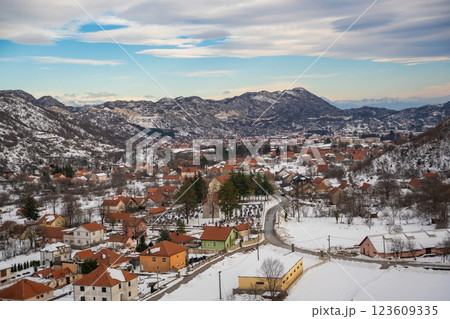 Aerial view of Lovcen mountains and Cetinje city in Montenegro in winter time Aerial view of Lovcen mountains and Cetinje city in Montenegro in winter time 123609335
