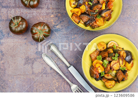 Delicious vegetable stew in a bowl on the table. 123609586
