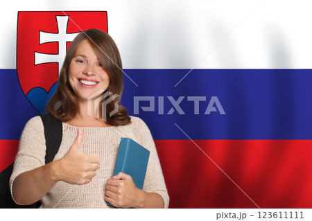 Pretty woman student against Slovak flag background. Travel, education and learn language concept 123611111