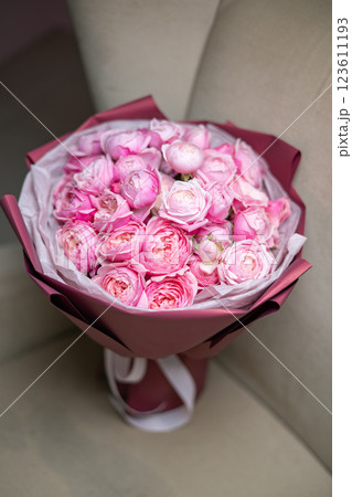 Beautiful pink bouquet of flowers. Vibrant Floral Arrangement Featuring a Variety of Colorful Blooms Beautiful pink bouquet of flowers. Vibrant Floral Arrangement Featuring a Variety of Colorful Blooms 123611193