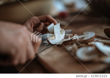 Slicing white mushroom. Preparation for drying. Slicing white mushroom. Preparation for drying. 123611222