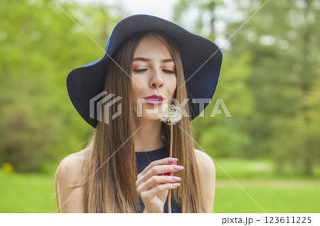 Happy woman outdoors. Portrait of young beauty model Happy woman outdoors. Portrait of young beauty model 123611225