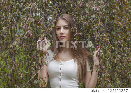 Young spring lady. Beautiful woman outdoors portrait Young spring lady. Beautiful woman outdoors portrait 123611227