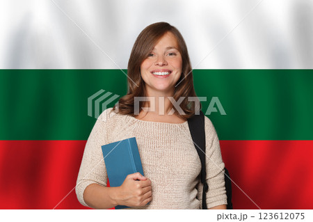 Cheerful woman student against Bulgarian flag background. Travel, education and learn language Cheerful woman student against Bulgarian flag background. Travel, education and learn language 123612075
