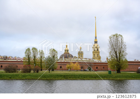 Spire and dome of Peter and Paul Cathedral and fortress wall in St. Petersburg, Russia, in autumn 123612875