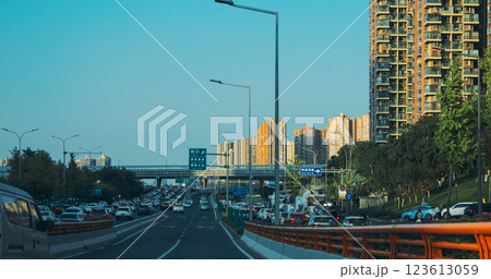 Chengdu, Sichuan, China. Road From Chengdu Tianfu International Airport To Chengdu City. Cars Drive On Highway In China. High-rise Houses Elevated View Cityscape Skyline On Background. Chengdu Is 123613059