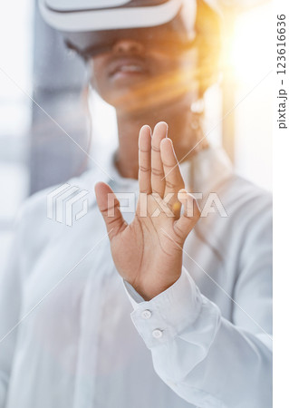 Businesswoman using vr glasses to view educational material and financial documents Businesswoman using vr glasses to view educational material and financial documents 123616636