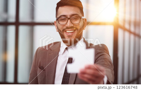 businessman show white jigsaw in hand, business strategy concept businessman show white jigsaw in hand, business strategy concept 123616748