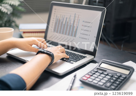 Finance bank tax expense accounting budget money businessman hand use calculator Financial calculate accountant close up calculator with graph chart write office desk Business expense analysis saving Finance bank tax expense accounting budget money businessman hand use calculator Financial calculate accountant close up calculator with graph chart write office desk Business expense analysis saving 123619099