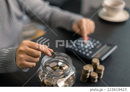 Finance bank tax expense accounting budget money businessman hand use calculator Financial calculate accountant close up calculator with graph chart write office desk Business expense analysis saving Finance bank tax expense accounting budget money businessman hand use calculator Financial calculate accountant close up calculator with graph chart write office desk Business expense analysis saving 123619423