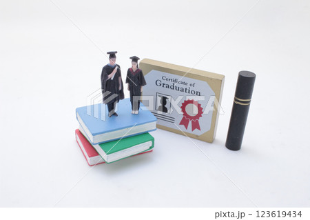 a Miniature Graduation Figures with Diploma, Books, a Miniature Graduation Figures with Diploma, Books, 123619434