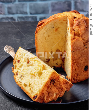 Panettone, sweet bread with raisins, top view 123619762