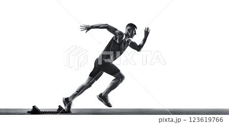 Side view photo of young athletic man, professional sportsman, running in motion against white studio background. Monochrome filter. Side view photo of young athletic man, professional sportsman, running in motion against white studio background. Monochrome filter. 123619766