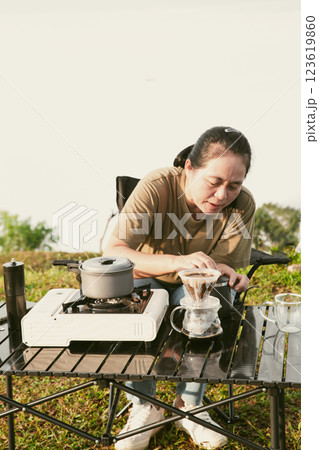 Morning coffee concept of cafe focus on nurturing coffee in harmony with nature organic seed create warm cup caffeine background green fresh great outdoor. aromatic drink rich aroma of rising from mug 123619860