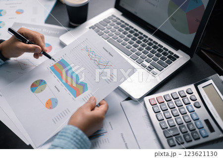 Finance bank tax expense accounting budget money businessman hand use calculator Financial calculate accountant close up calculator with graph chart write office desk Business expense analysis saving Finance bank tax expense accounting budget money businessman hand use calculator Financial calculate accountant close up calculator with graph chart write office desk Business expense analysis saving 123621130