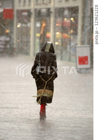 Woman in the rain Woman in the rain 123621228