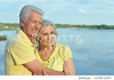 Loving mature couple in the park in summer Loving mature couple in the park in summer 123621267