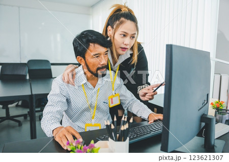 Young female employee seducing boss or supervisor at work Make your boss uncomfortable and afraid of sexual abuse. Concept of sexual harassment in the workplace 123621307