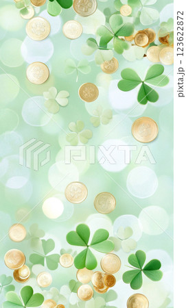 St. Patricks Day clovers and gold coins on green glitter background 123622872