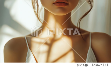 Woman in sun with shadows 123624151
