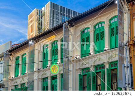 Colorful old colonial style houses with modern building in the background, China town, Singapore Colorful old colonial style houses with modern building in the background, China town, Singapore 123625673