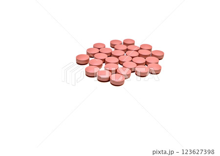 Selective focus of a handful of pills on the white background. Pharmacist. Medicine 123627398