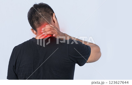 Neck pain and stress concept, Close up of man with neck pain, man with neck muscle pain, a man with neck pain on isolated background. Neck pain and stress concept, Close up of man with neck pain, man with neck muscle pain, a man with neck pain on isolated background. 123627644