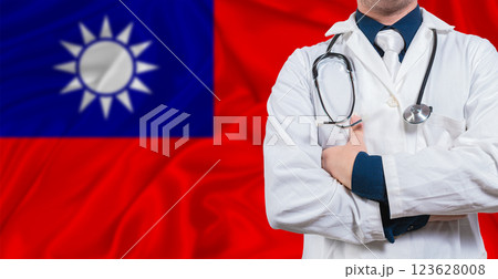 Male doctor with stethoscope on Taiwanese flag. Doctor holding stethoscope on Taiwanese flag 123628008