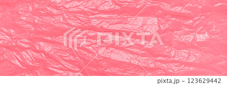 A textured pink crumpled paper background with natural creases and folds. Ideal for design projects, digital graphics, or creative presentations requiring a vibrant, Long banner A textured pink crumpled paper background with natural creases and folds. Ideal for design projects, digital graphics, or creative presentations requiring a vibrant, Long banner 123629442