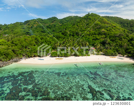 Tropical beach with corals and clear water. Cobrador Island. Romblon, Philippines. Tropical beach with corals and clear water. Cobrador Island. Romblon, Philippines. 123630801