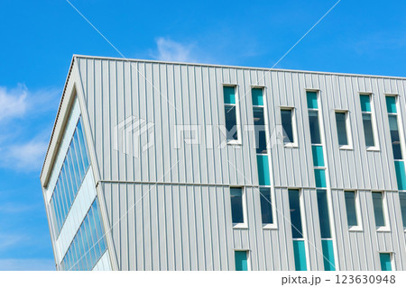 Office building with geometric design in the downtown area of the city. 123630948