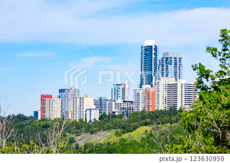 Downtown of Edmonton with skyscrapers, green park and blue sky. Downtown of Edmonton with skyscrapers, green park and blue sky. 123630950
